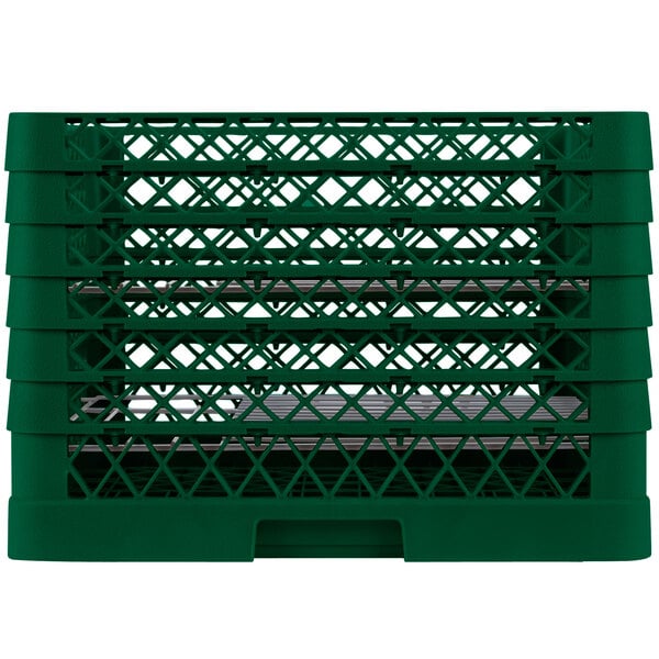 A green plastic rack with 19 compartments for plates.