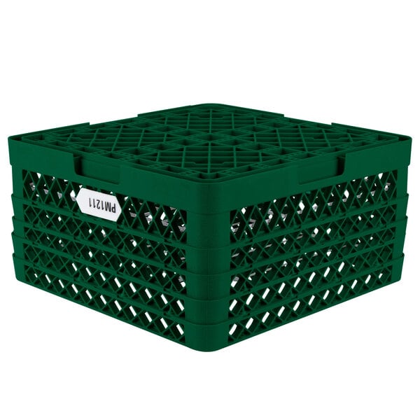 A green plastic Vollrath Traex Plate Crate with 12 compartments for plates.