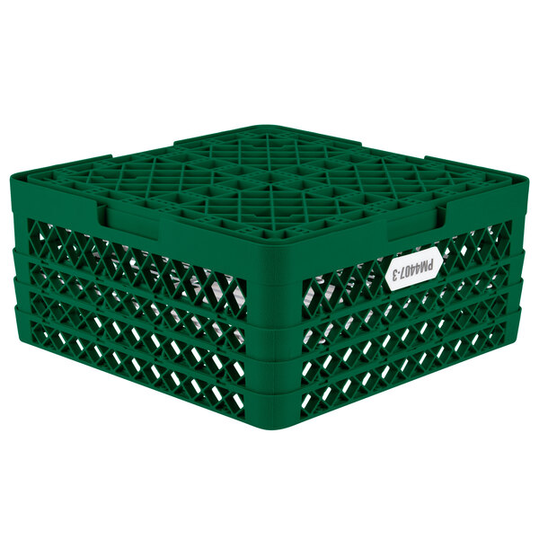 A green plastic Vollrath Traex Plate Crate with holes.