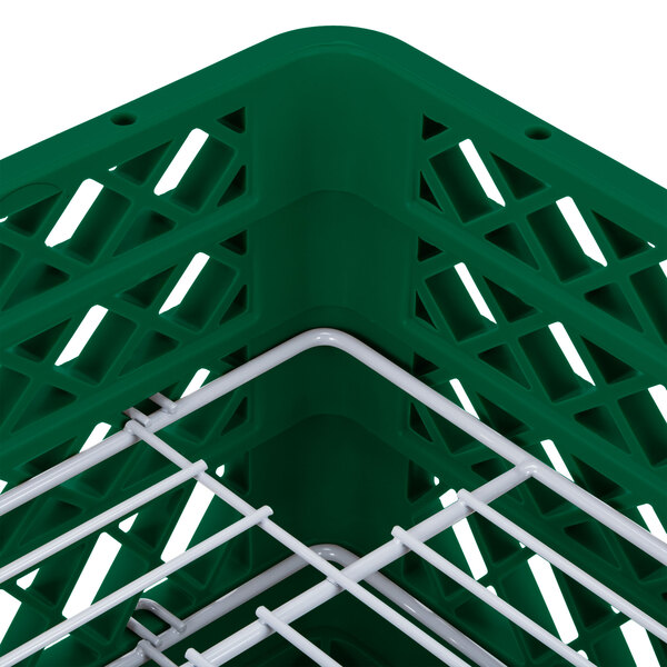 A green plastic Vollrath Traex Plate Crate for 44 plates.