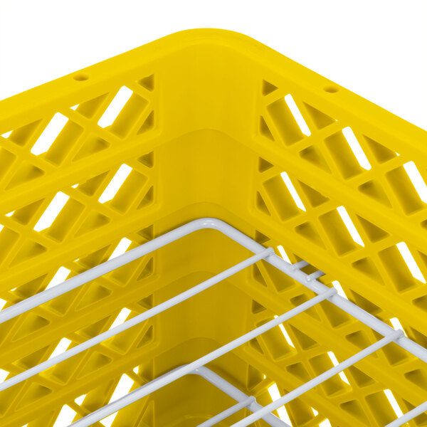 A yellow plastic Vollrath Traex Plate Crate with white wire.