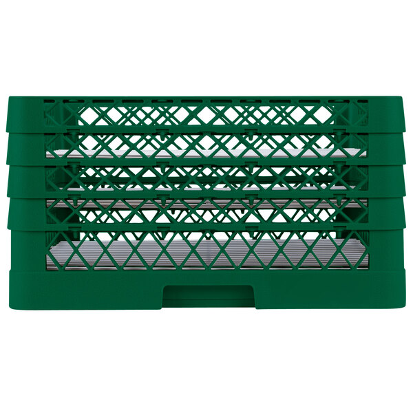 A green plastic rack with three rows of holes.