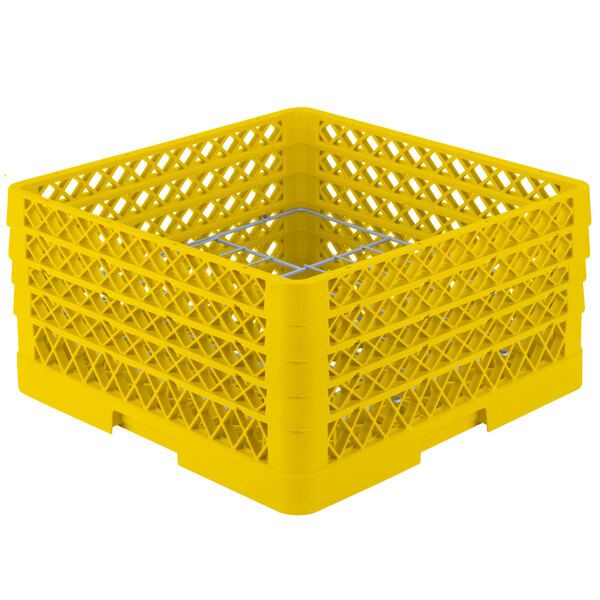 A yellow plastic Vollrath Plate Crate with white wire dividers.