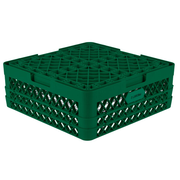 A green plastic Vollrath Traex Plate Crate with 38 compartments for 5" to 6 1/8" plates.