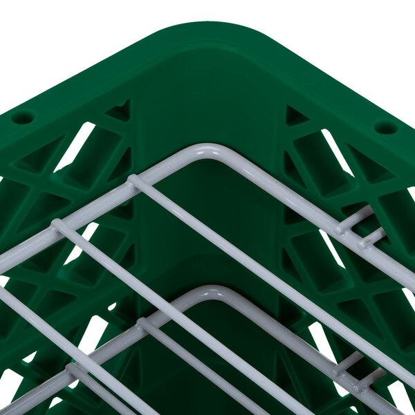 A green Vollrath Traex Plate Crate with metal bars.