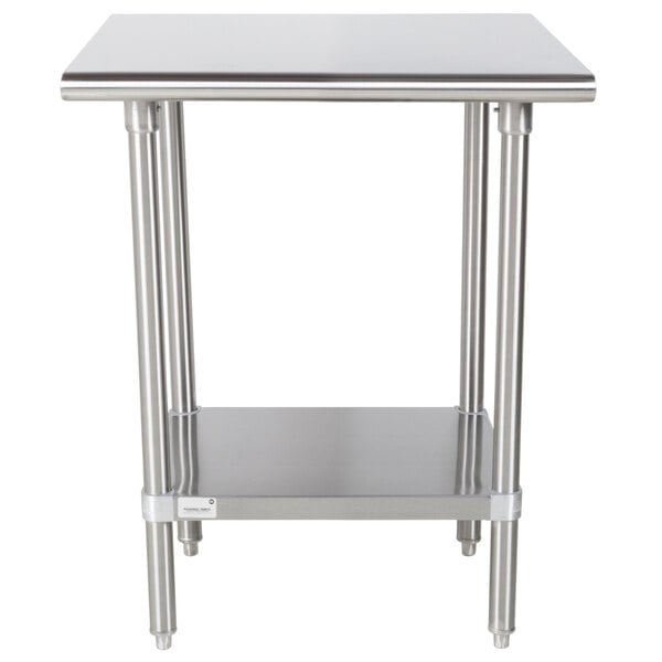 An Advance Tabco stainless steel work table with a shelf.