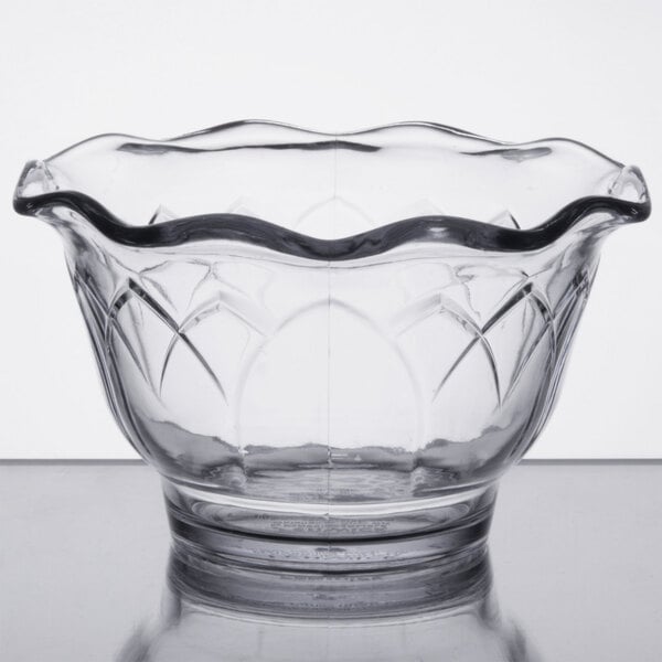 A clear Dinex Fenwick cup on a table.