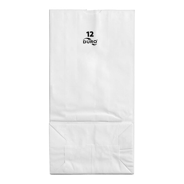 A white paper bag with black text that reads "12 lbs."