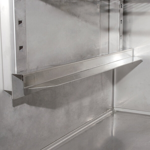 An Avantco stainless steel bun pan rail.