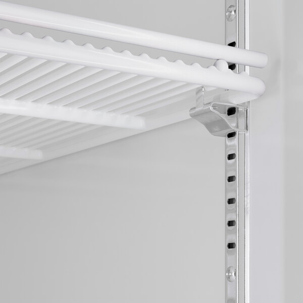 A white shelf in a Beverage-Air MarketMax glass door refrigerator.