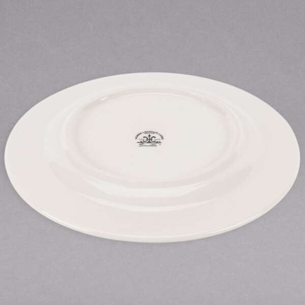 A Homer Laughlin Seville ivory china plate with a small black logo.
