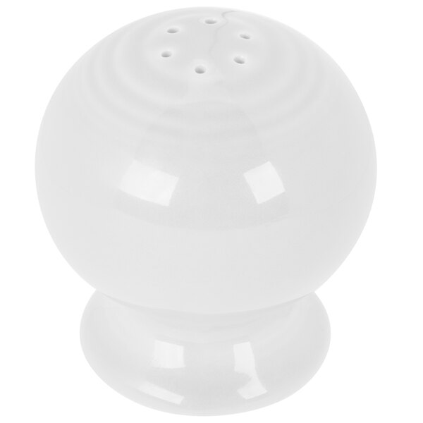 A white round Fiesta pepper shaker.