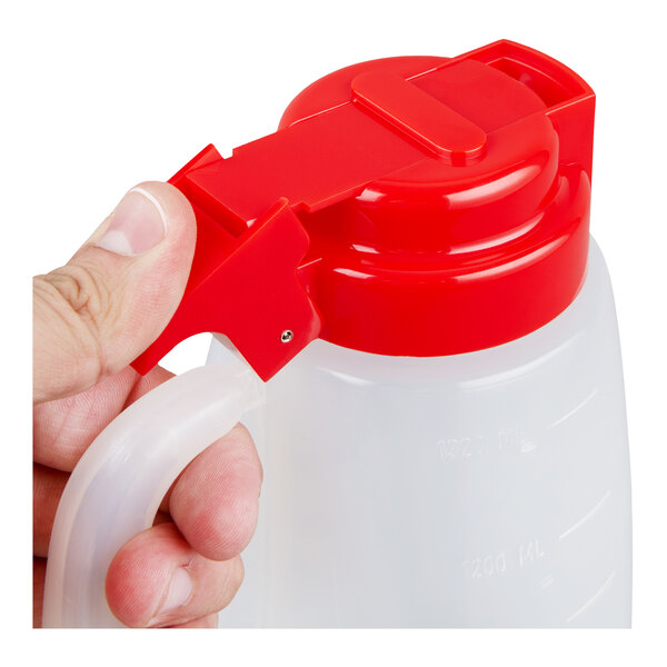 A black oval ceramic crock insert for a slow cooker.