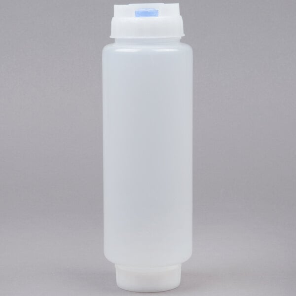 A white plastic bottle with a blue cap.