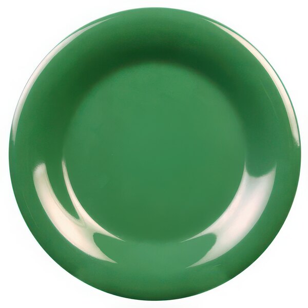 A close-up of a green Thunder Group wide rim melamine plate.