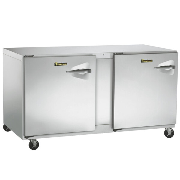 A Traulsen undercounter freezer with two left hinged doors.