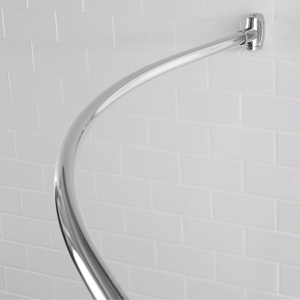A Crescent curved shower rod with bright finish.