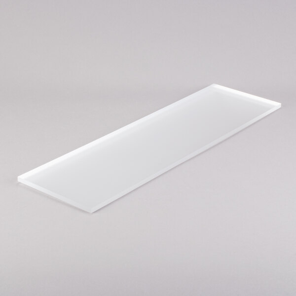 A rectangular Eastern Tabletop tempered glass buffet shelf.