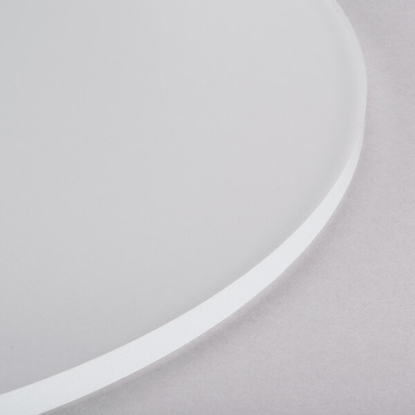 An Eastern Tabletop round acrylic display shelf with a circular edge.