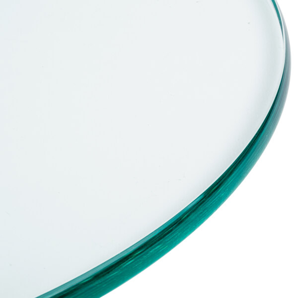 A close-up of the Eastern Tabletop tempered glass display shelf.