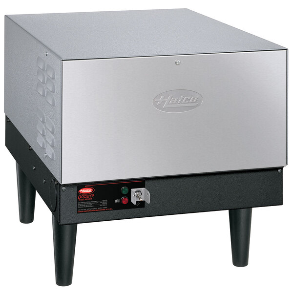 A silver square box with black legs, the Hatco C-39 Compact Booster Water Heater.