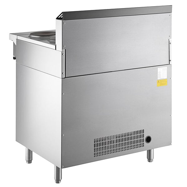 A large stainless steel Garland electric restaurant range with a standard oven.