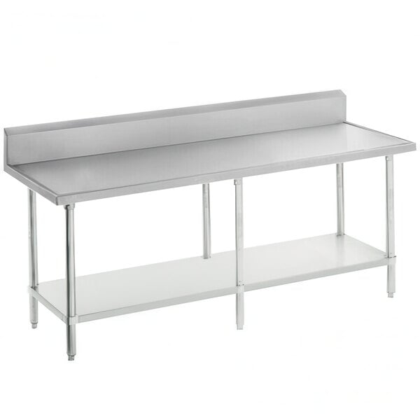 A stainless steel Advance Tabco work table with backsplash and undershelf.