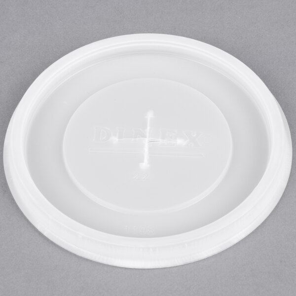 A translucent plastic lid with a logo on it.