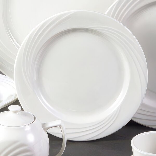 A group of CAC Garden State bone white porcelain plates.