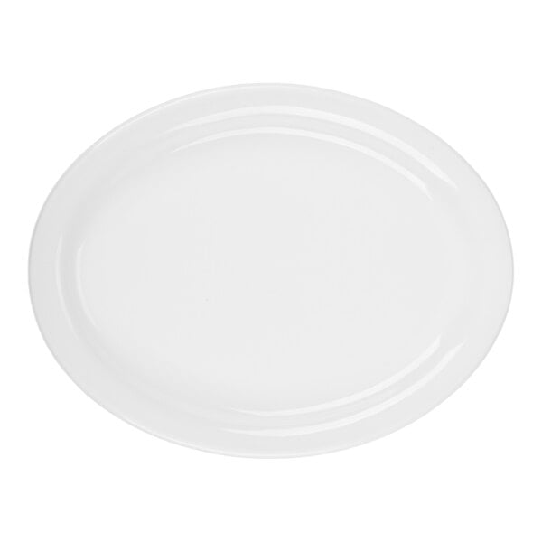 An oval-shaped, bright white china platter with a narrow rim.