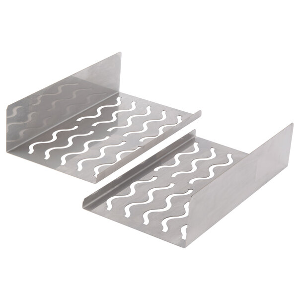 A pair of metal trays with wavy lines.