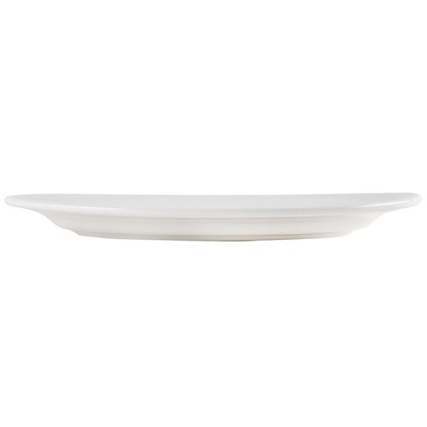A Homer Laughlin bright white oval china platter with a small rim on a white background.