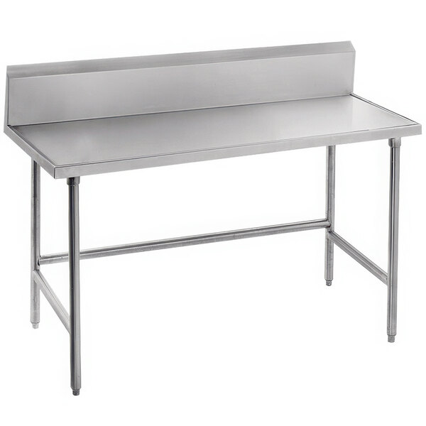 A stainless steel Advance Tabco work table with a long top and backsplash.