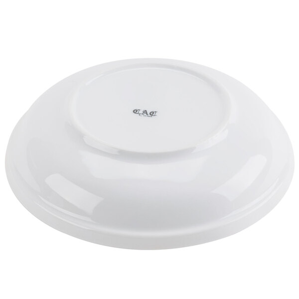 A white porcelain salad bowl with a rolled edge.