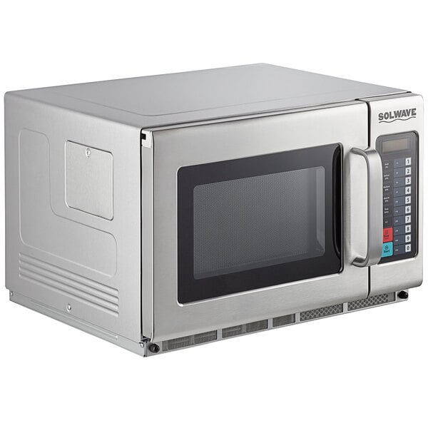 A Solwave stainless steel commercial microwave with a glass door.