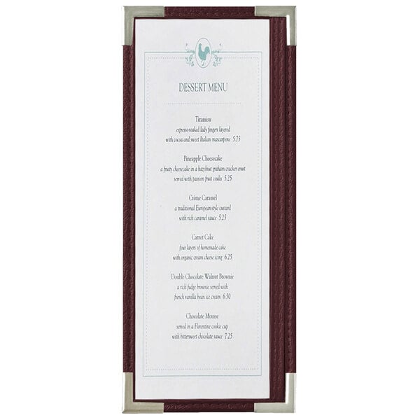 A Menu Solutions menu board with a burgundy leather cover and silver corners.