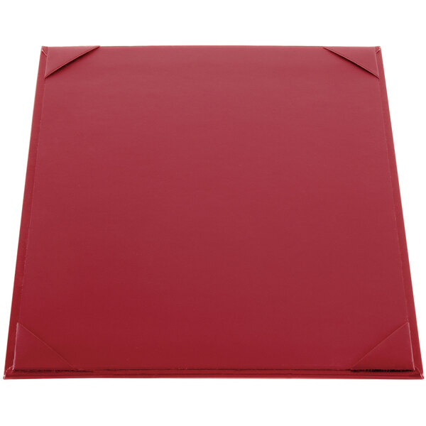 A red square menu board with a metal edge.