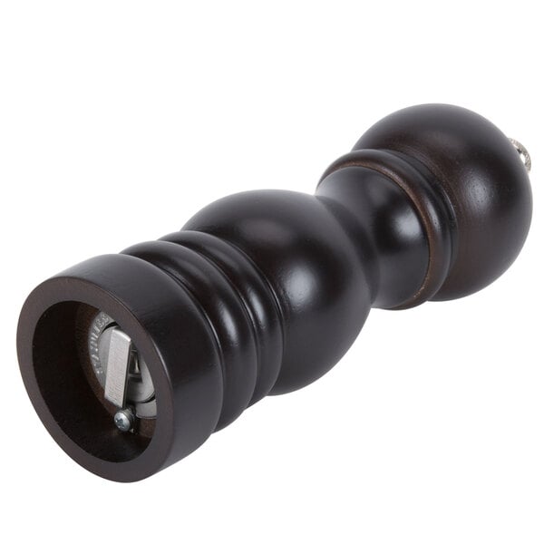 A black metal pepper mill and salt shaker combo with a metal handle.