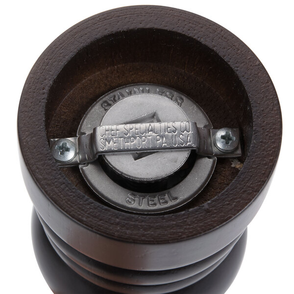 A close up of the Chef Specialties black pepper mill and salt shaker combo.