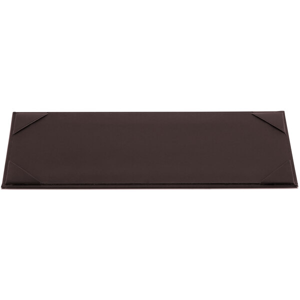 A brown rectangular Menu Solutions menu board on a black table.