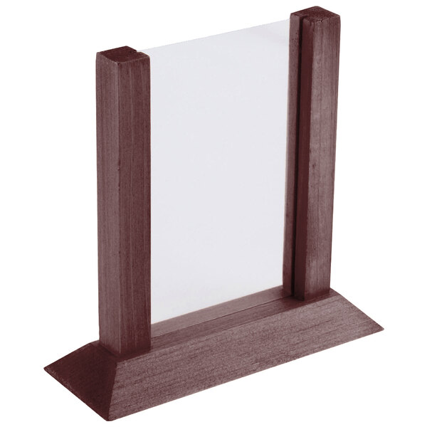 A mahogany wood table tent with clear panels on a table.