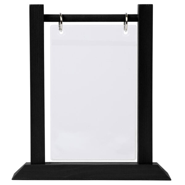 A black rectangular wood table tent with white inserts and rings.