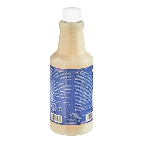 A close-up of a Noble Chemical Vanish Laundry Pre-Spotter/Stain Remover bottle with a blue label.