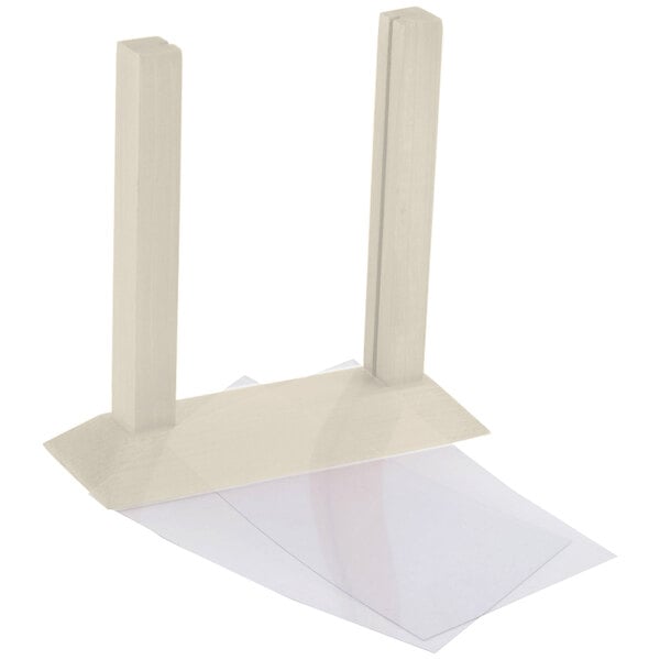 An almond wood Menu Solutions table tent with a white paper inside.