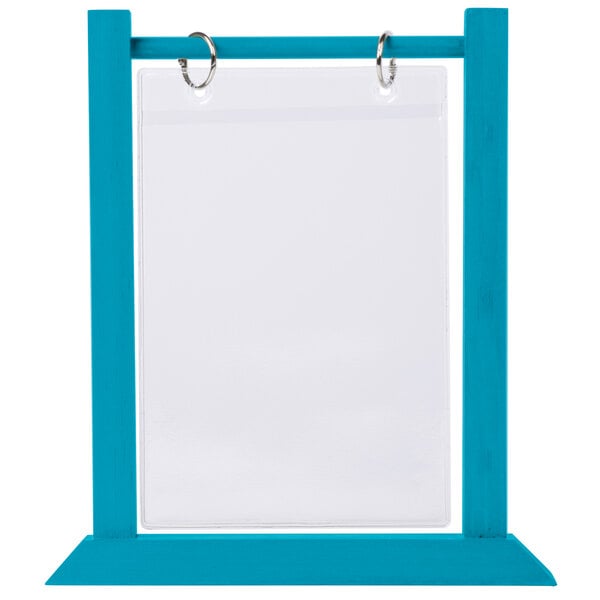 A white board with a sky blue wood frame holding white paper.