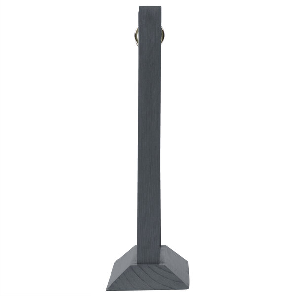 A black rectangular wooden table tent with a white border.