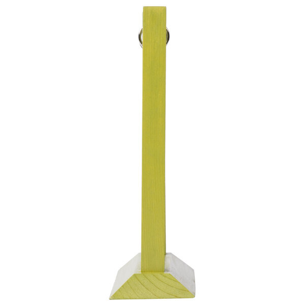 A lime wood table tent with a metal ring and white border.