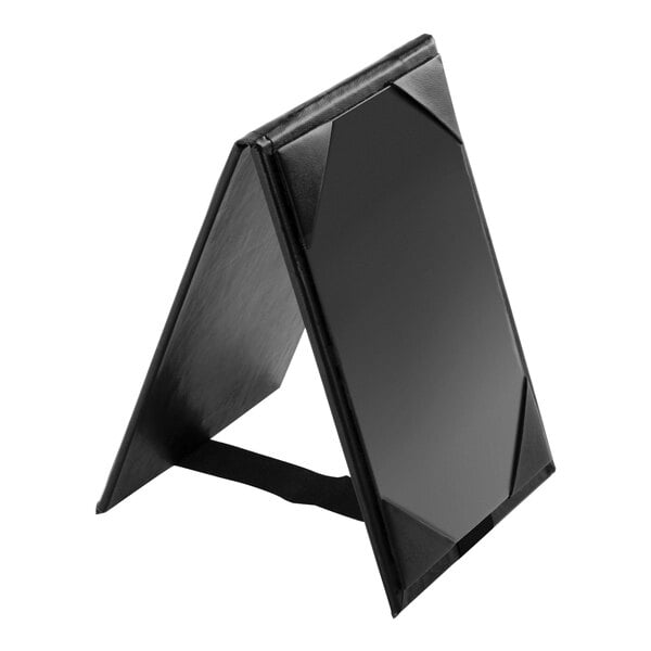 A black Menu Solutions A-frame table tent with picture corners on a table.