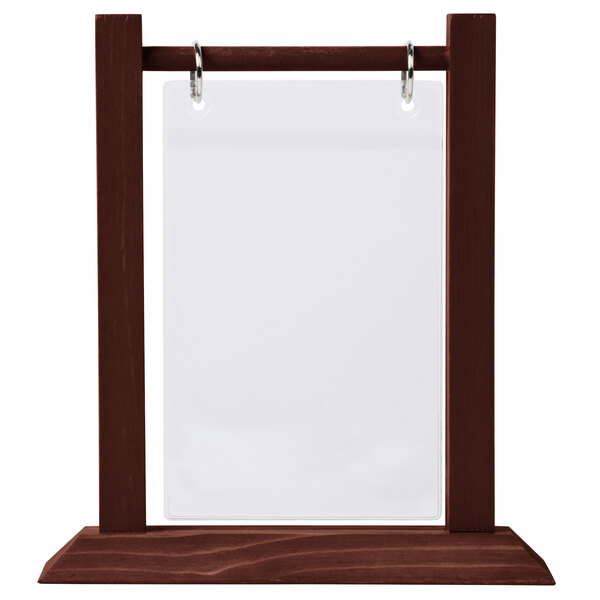 A mahogany wood table tent with a white paper insert and rings.