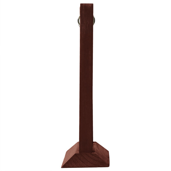 A brown rectangular wooden table tent with a metal ring on a stand.